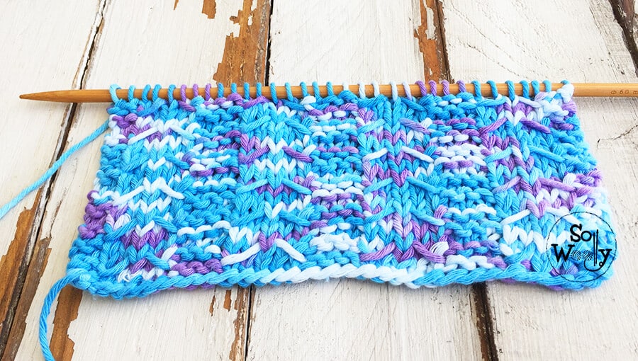 Knitting pattern for variegated yarn and video tutorial: Arrowhead slipped stitch. So Woolly.