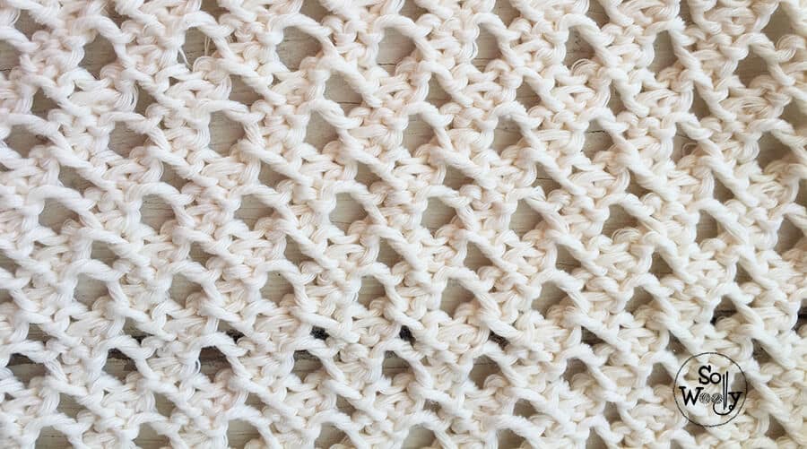 Four-row repeat easy lace stitch. Knitting pattern for beginners. So Woolly.