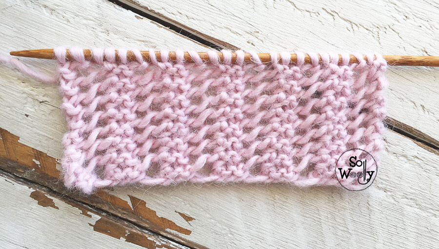 One-row repeat reversible lace knitting stitch pattern (written instructions and video tutorial). So Woolly.