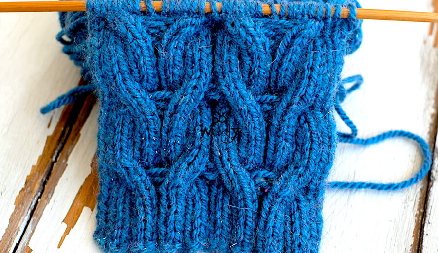 Easy cable reversible knitting pattern and tutorial. So Woolly.