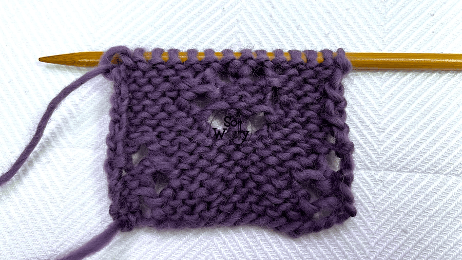 How to knit the Cat's Pow Eyelets stitch (wrong side of the work). So Woolly.