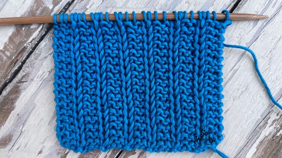 1-row reversible knitting stitch